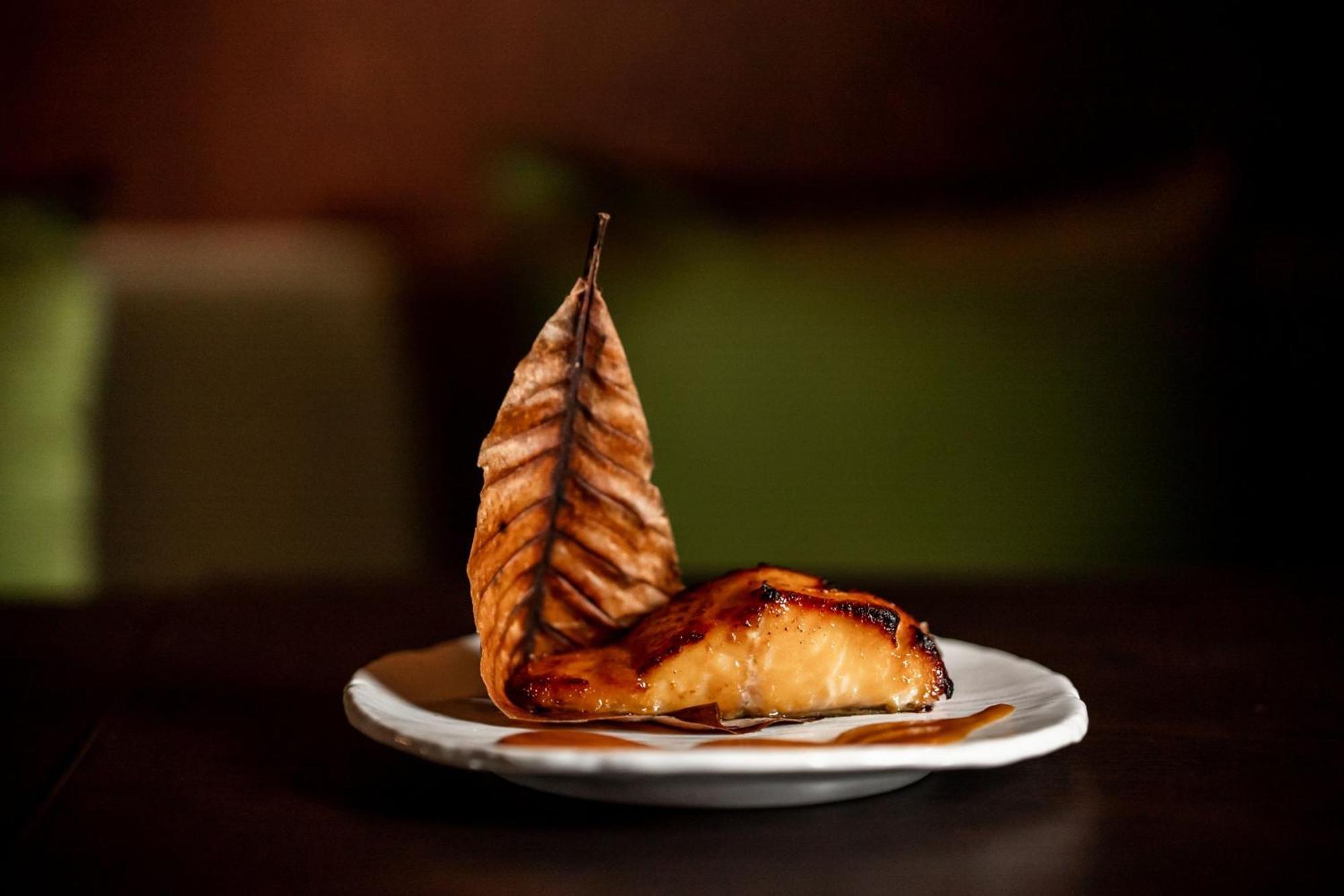 The Dubai Edition Exterior foto Smoked and grilled salmon